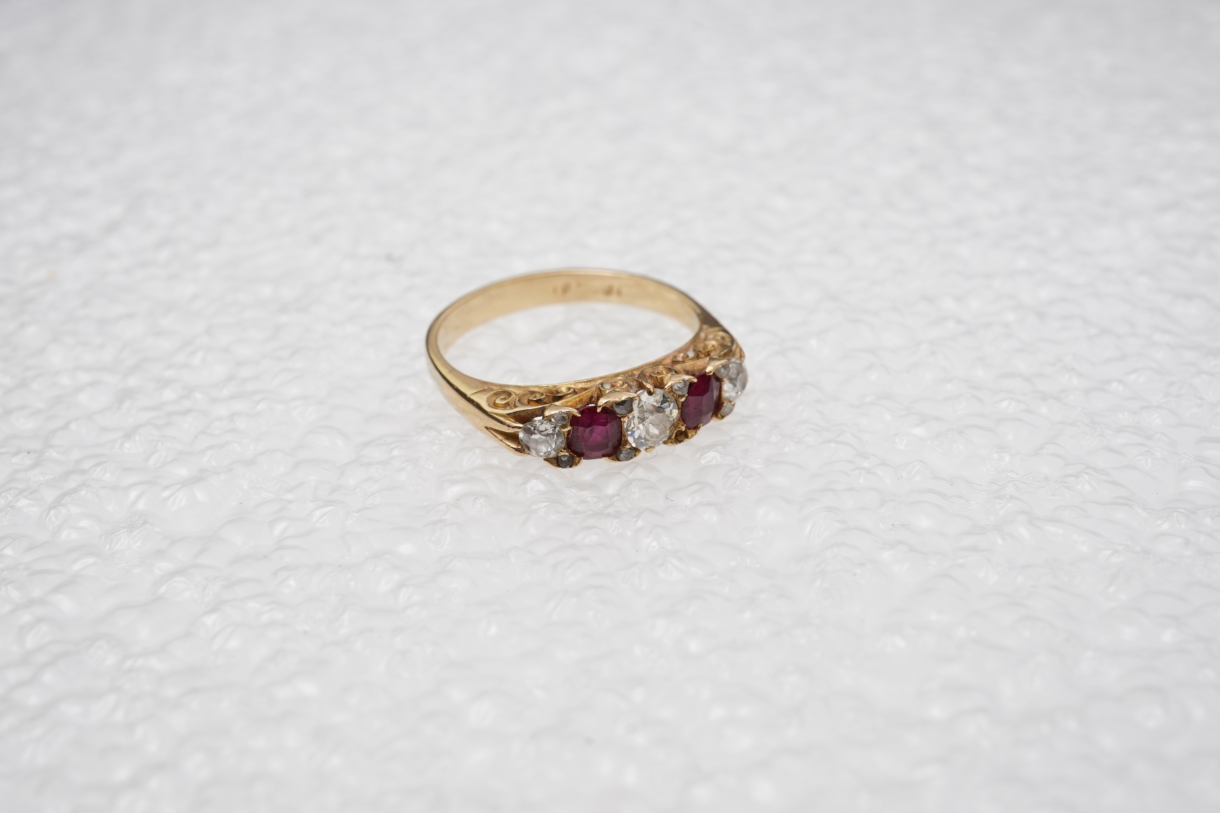 A ruby and diamond five-stone ring, early 20th century